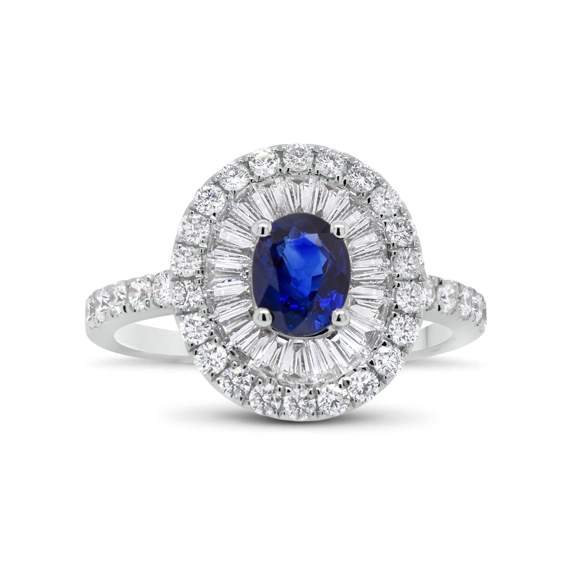 Sapphire double halo ring  - 18K gold weighing 3.88 grams  - 32 round diamonds totaling 0.55 carats  - 21 tapered baguettes totaling 0.51 carats  - 0.82 ct sapphire