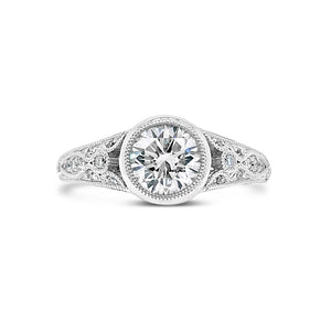 Bezel-Set Diamond Engagement Ring with Milgrain  - 18KT white gold weighting 3.90GR    - 60 round diamonds totaling 0.46 carats  - 1 Round Diamond totaling .92 GIA-G-VS1