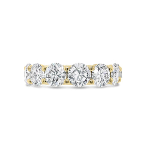 Diamond Eternity Ring - 18K gold weighing 9.20 grams - 13 round diamonds totaling 6.87 carats (GIA-graded E-G color, VVS2-SI2 clarity)