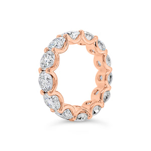 Diamond Eternity Ring - 18K gold weighing 9.20 grams - 13 round diamonds totaling 6.87 carats (GIA-graded E-G color, VVS2-SI2 clarity)
