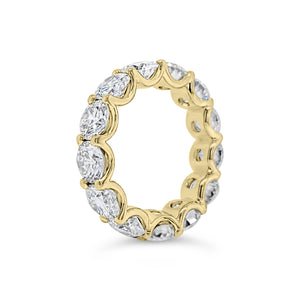 Diamond Eternity Ring - 18K gold weighing 9.20 grams - 13 round diamonds totaling 6.87 carats (GIA-graded E-G color, VVS2-SI2 clarity)