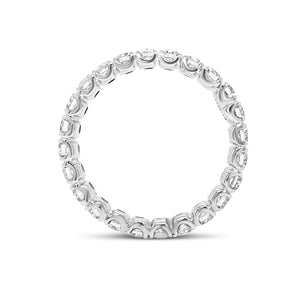 Simple Four Prong-Set Diamond Eternity Band -18k gold weighing 2.38 grams -24 round diamonds weighing 1.49 carats