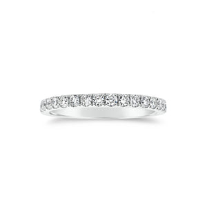 Slim Four Prong-Set Diamond Eternity Band -18k gold weighing 1.60 grams -34 round four prong-set diamonds weighing .71 carats