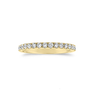 Slim Four Prong-Set Diamond Eternity Band -18k gold weighing 1.60 grams -34 round four prong-set diamonds weighing .71 carats