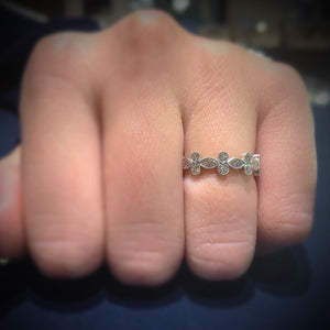 Female Model Wearing Alternating Marquise & Round Diamond Eternity Band with Milgrain -18k gold weighing 2.96 grams -10 marquise diamonds weighing 0.90 carats -20 round diamonds weighing .70 carats