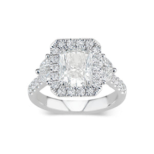 Elongated Radiant-Cut Diamond Engagement Ring  -18K weighting 5.07 GR  - 28 round diamonds totaling 0.60 carats  - 4 half moon diamonds totaling 0.51 carats