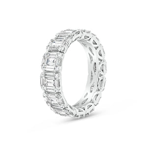 Illusion set Baguette & Round Eternity Ring -18k gold weighing 4.16 grams -56 round diamonds weighing .31 carats -70 straight baguettes weighing 2.59 carats