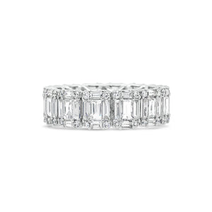 Illusion set Baguette & Round Eternity Ring -18k gold weighing 4.16 grams -56 round diamonds weighing .31 carats -70 straight baguettes weighing 2.59 carats