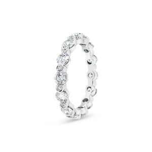 Single Prong Diamond Eternity Ring -18k gold weighing 2.72 grams -14 round bezel-set diamonds weighing 1.81 carats -14 round bezel-set diamonds weighing .14 carats