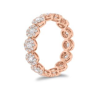 Halo Diamond Eternity Ring - 18K gold weighing 2.90 grams - 126 round diamonds totaling 0.68 carats - 14 round diamonds totaling 0.79 carats