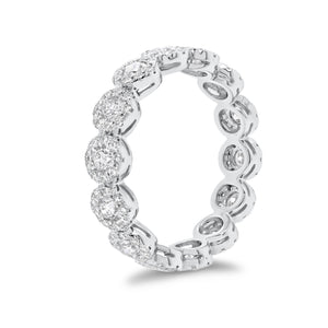 Halo Diamond Eternity Ring - 18K gold weighing 2.90 grams - 126 round diamonds totaling 0.68 carats - 14 round diamonds totaling 0.79 carats