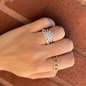 Female Model Wearing 2.62 ct Diamond Eternity Ring - 18K gold weighing 2.48 grams - 17 round diamonds weighing 2.62 carats