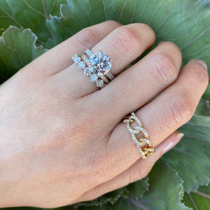 Female Model Wearing 2.62 ct Diamond Eternity Ring - 18K gold weighing 2.48 grams - 17 round diamonds weighing 2.62 carats