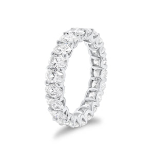 Oval Diamond Eternity Band - 18K gold weighing 3.11 grams - 21 oval brilliant-cut diamonds totaling 3.15 carats (GIA-graded G color, VS clarity)
