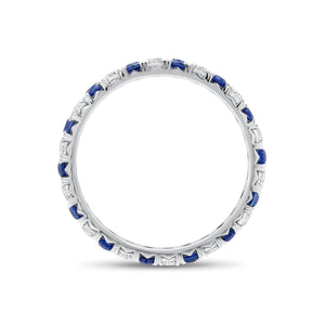Sapphire and Diamond Eternity Ring - 18K gold weighing 1.52 grams - 14 sapphires weighing 0.70 carats - 14 round diamonds weighing 0.47 carats