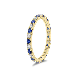 Sapphire and Diamond Eternity Ring - 18K gold weighing 1.52 grams - 14 sapphires weighing 0.70 carats - 14 round diamonds weighing 0.47 carats