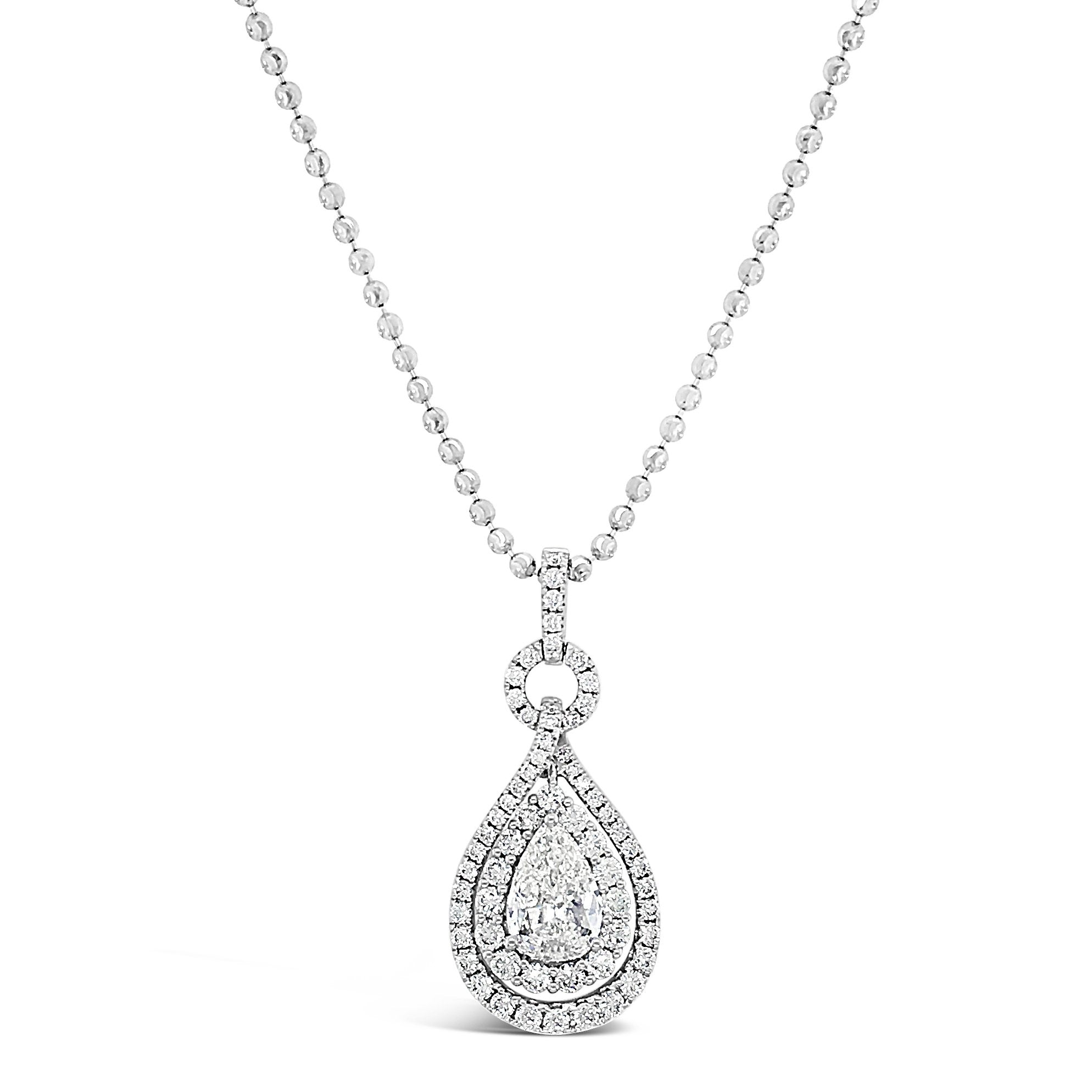 Pear-Shaped Diamond Pendant Necklace  -18K gold weighing 3.29 grams  -64 round diamonds totaling 1.01 carats  -1.10 carat pear-shaped diamond (GIA-graded K-color, VS2 clarity)