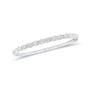Diamond Ovals Bangle Bracelet - 18K gold weighing 11.62 grams  - 14 oval-shaped diamonds weighing 4.83 carats