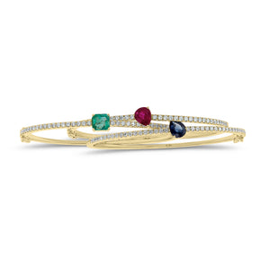 Radiant-Cut Emerald & Diamond Bangle Bracelet - 14K gold weighing 8.67 grams - 38 round diamonds weighing 0.55 carats - 0.74 ct emerald
