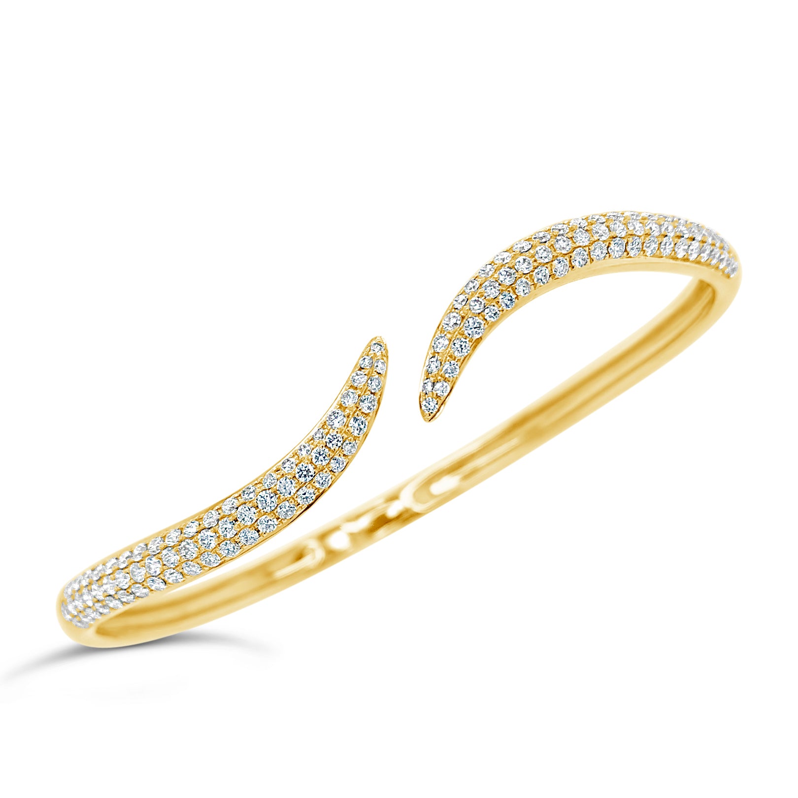 gold bracelet with diamonds on white background