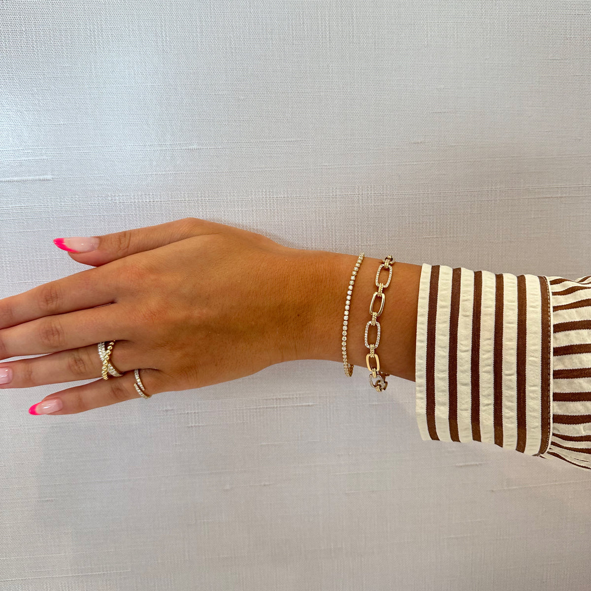 Female Model Wearing Diamond & Beaded Gold Crossover Ring - 14K gold weighing 5.59 grams - 34 round diamonds weighing 0.38 carats