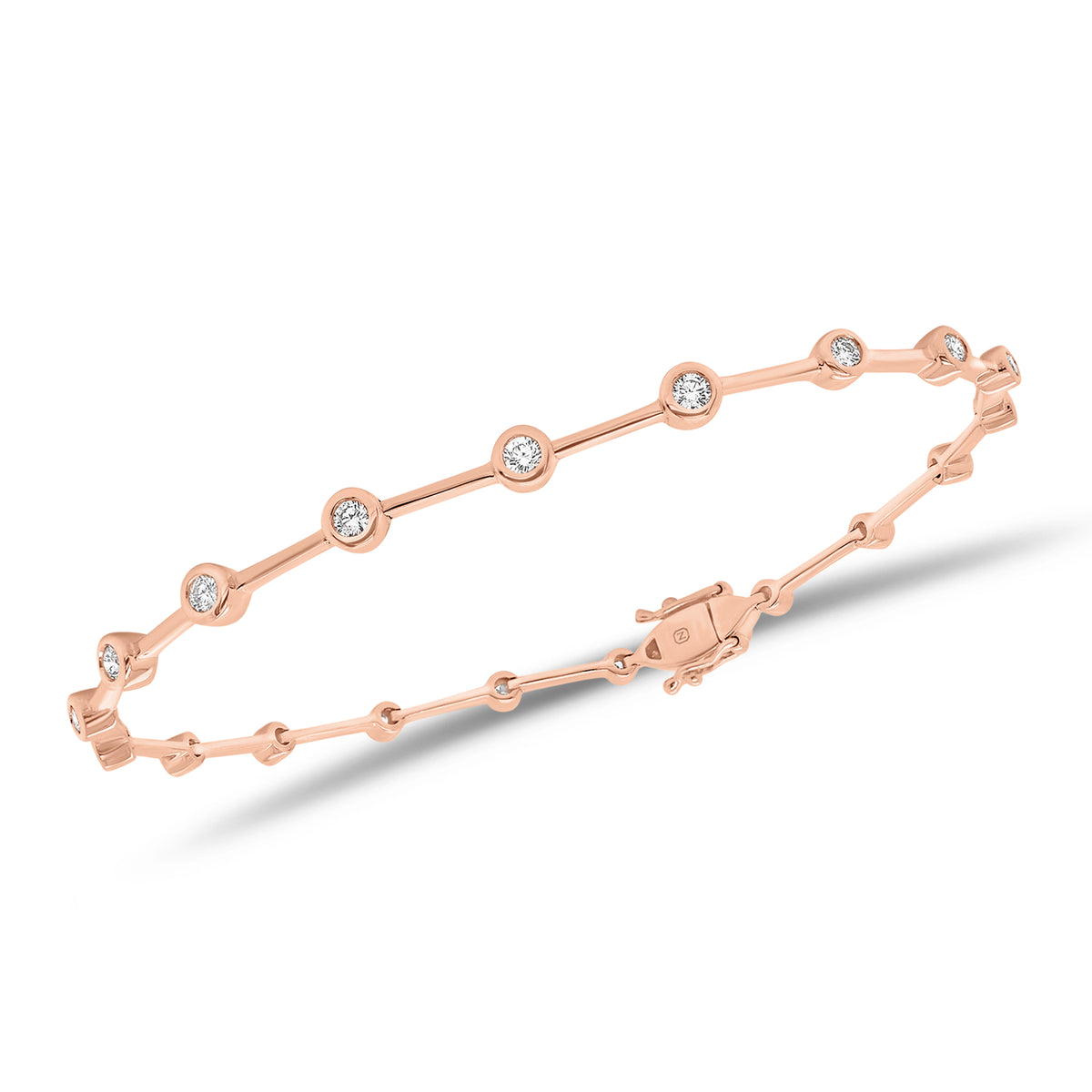 Bezel-set diamond bar bracelet- 14K gold weighing 5.56 grams  - 19 round diamonds weighing 0.44 carats