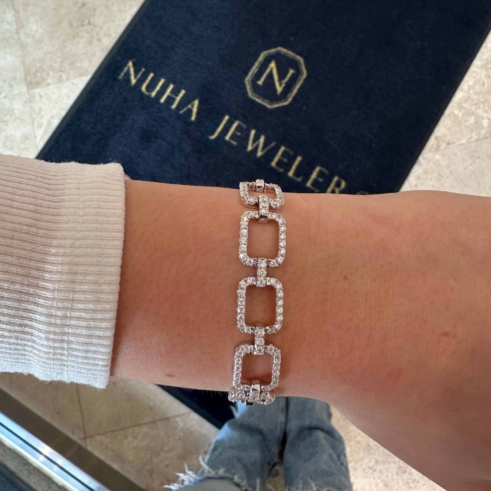 Diamond Rectangle Link Bracelet  - 18K gold weighing 19.76 grams  - 228 round diamonds totaling 3.65 carats