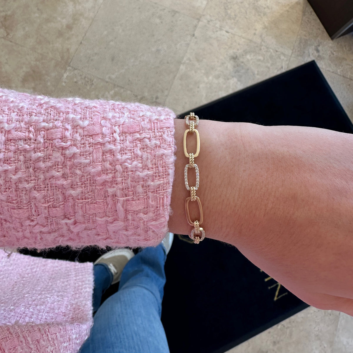 Female Model Wearing Diamond & Rope Elongated Chain Bracelet - 14K gold weighing 9.74 grams - 108 round diamonds weighing 0.65 carats