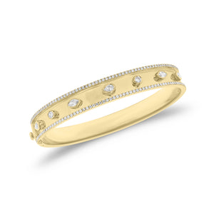 Bezel-Set Diamond Shapes Bangle Bracelet - 18K gold weighing 22.57 grams  - 142 round diamonds weighing 0.86 carats  - 2 marquise-shaped diamonds weighing 0.23 carats  - 3 pear-shaped diamonds weighing 0.32 carats