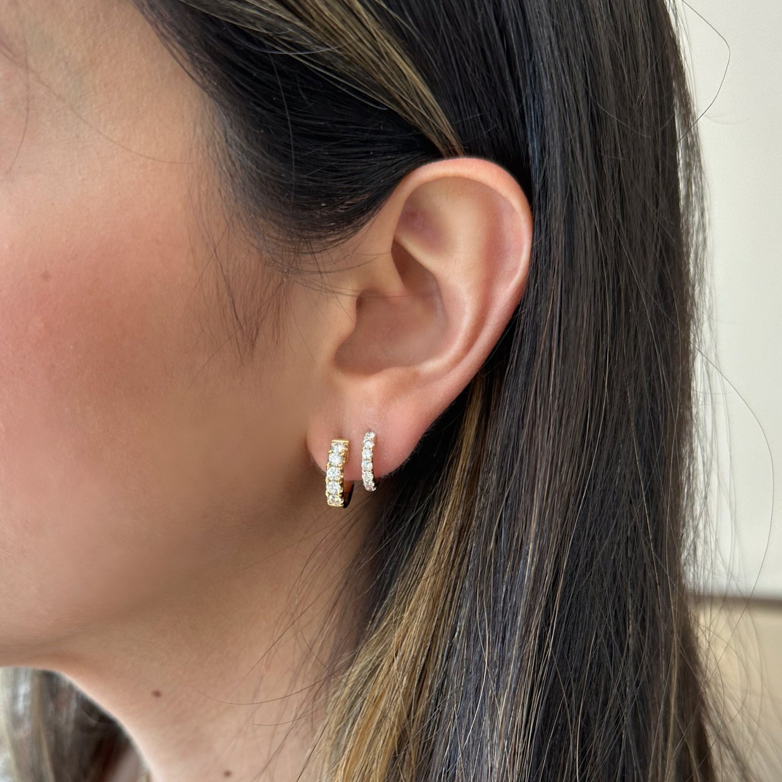 Petite diamond horse-shoe huggie earrings -18k gold weighing 1.90 grams  -14 round diamonds weighing .54 carats