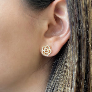Female Model Wearing Diamond Rose Cutout Stud Earrings - 14K gold weighing 2.11 grams - 104 round diamonds weighing 0.32 carats