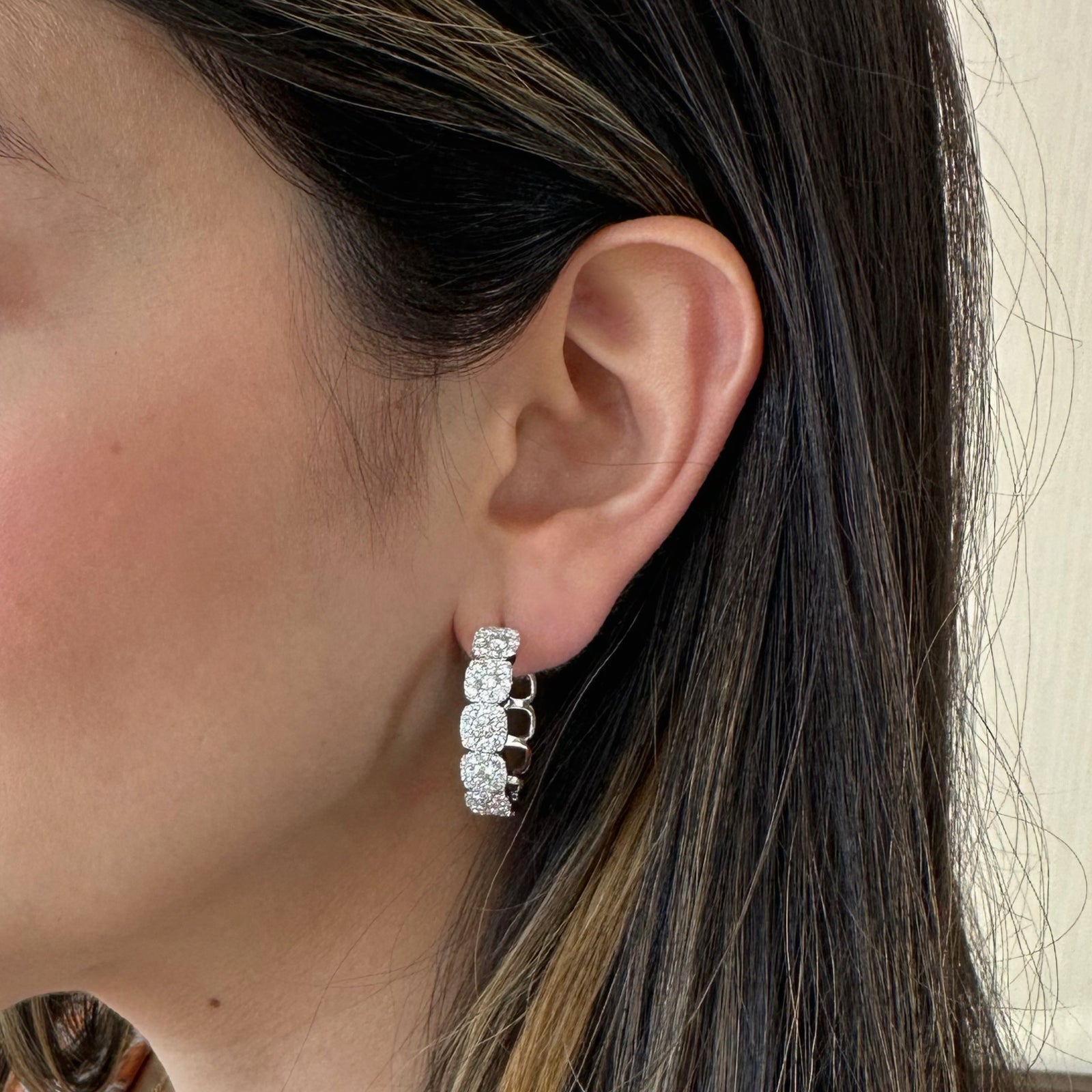 Cushion halo diamond hoop earrings 18k gold, 10.88 grams, 12 round shared prong-set diamonds 1.56 carats, 96 round shared prong-set diamonds 2.43 carats.  Earring size 28 millimeter diameter, 6.7 millimeter width.