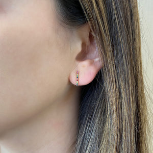 Female Model Wearing Rainbow Gemstone Bar Stud Earrings - 14K gold weighing 1.21 grams - 20 multicolor gemstones weighing 0.13 carats