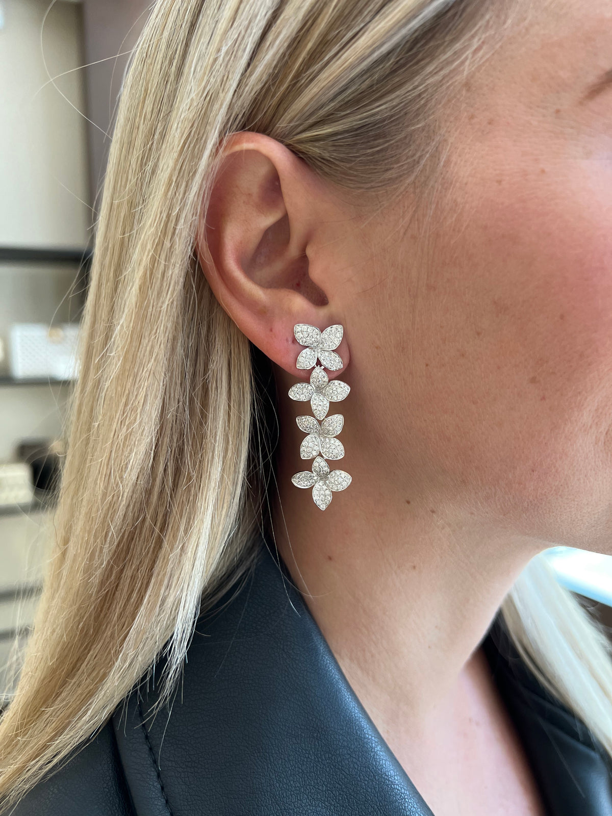 Female Model Wearing Diamond Flower Petal Statement Earrings - 14K gold weighing 8.03 grams - 376 round diamonds weighing 3.40 carats