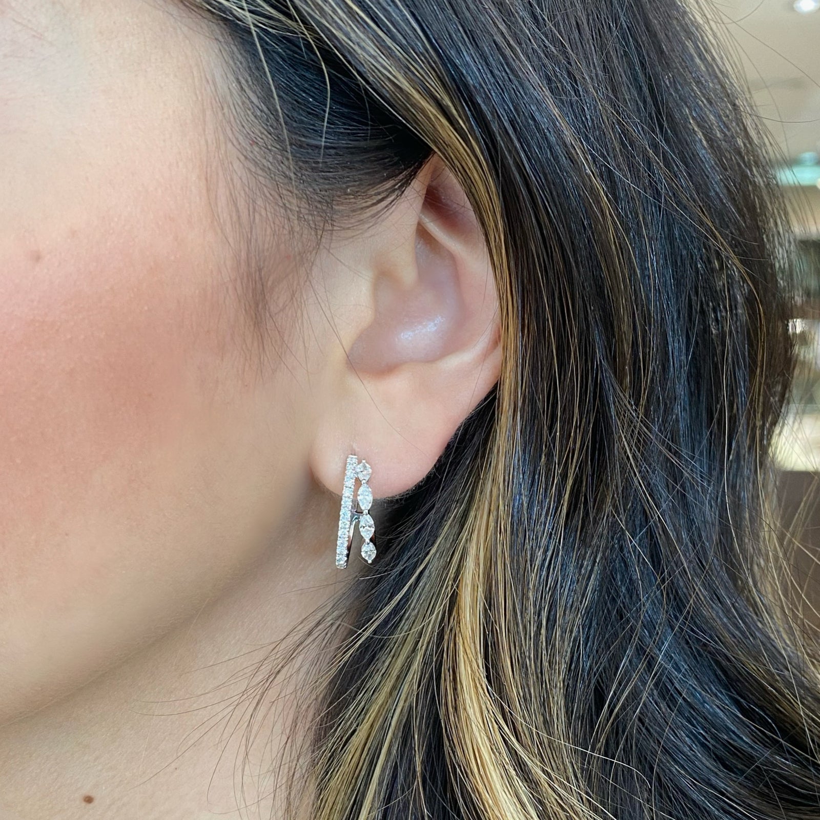 Marquise & Round Diamond Double Hoop Earrings - 18K gold weighing 5.50 grams - 28 round diamonds weighing 0.37 carats - 8 marquise-shaped diamonds weighing 0.69 carats