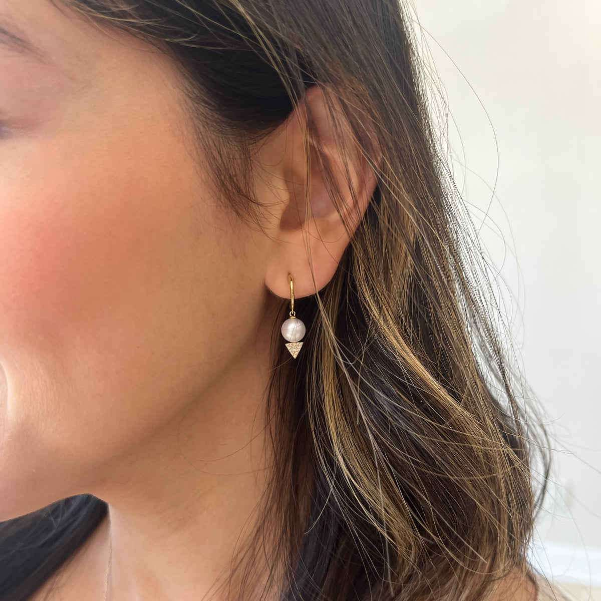 Female Model Wearing - 14K gold weighing 1.48 grams  - 30 round diamonds weighing 0.09 carats