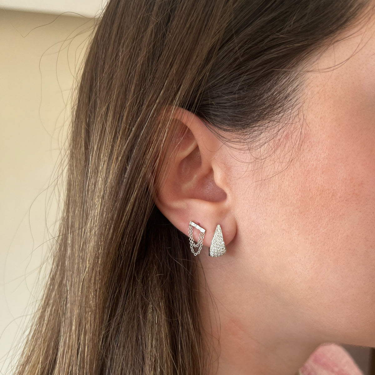 Female Model Wearing Pave Diamond Fanned Huggie Earrings - 14K gold weighing 3.51 grams - 82 round diamonds weighing 0.79 carats