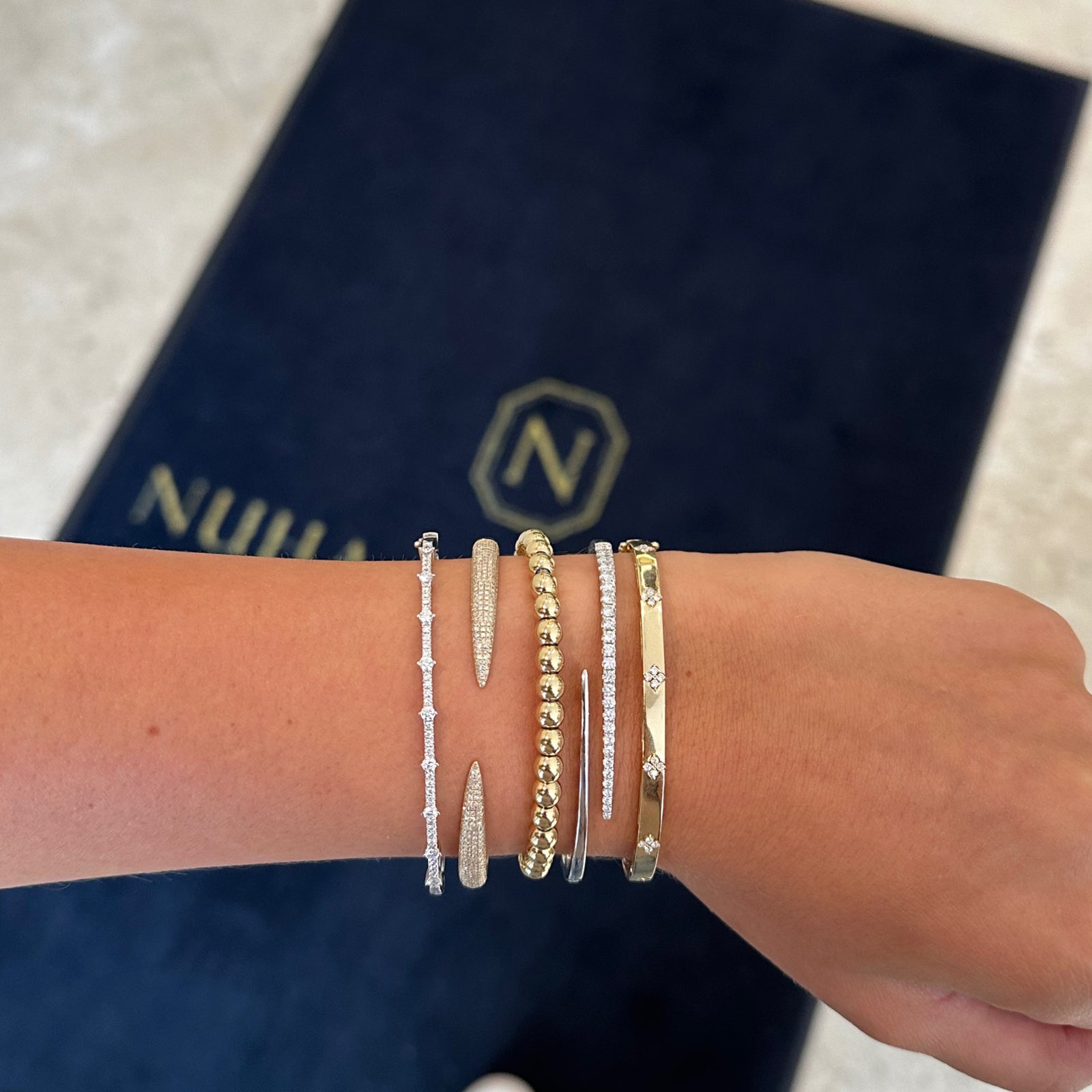 Diamond Open Spiral Bangle Bracelet - 14K gold weighing 12.44 grams - 26 round diamonds weighing 0.90 carats
