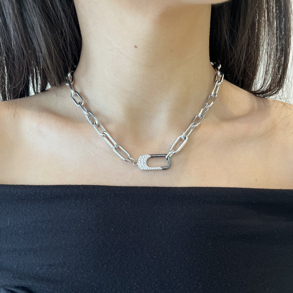 Female Model Wearing Paperclip Chain Necklace with Diamond Lock - 14K gold weighing 23.40 grams - 27 round diamonds weighing 0.43 carats