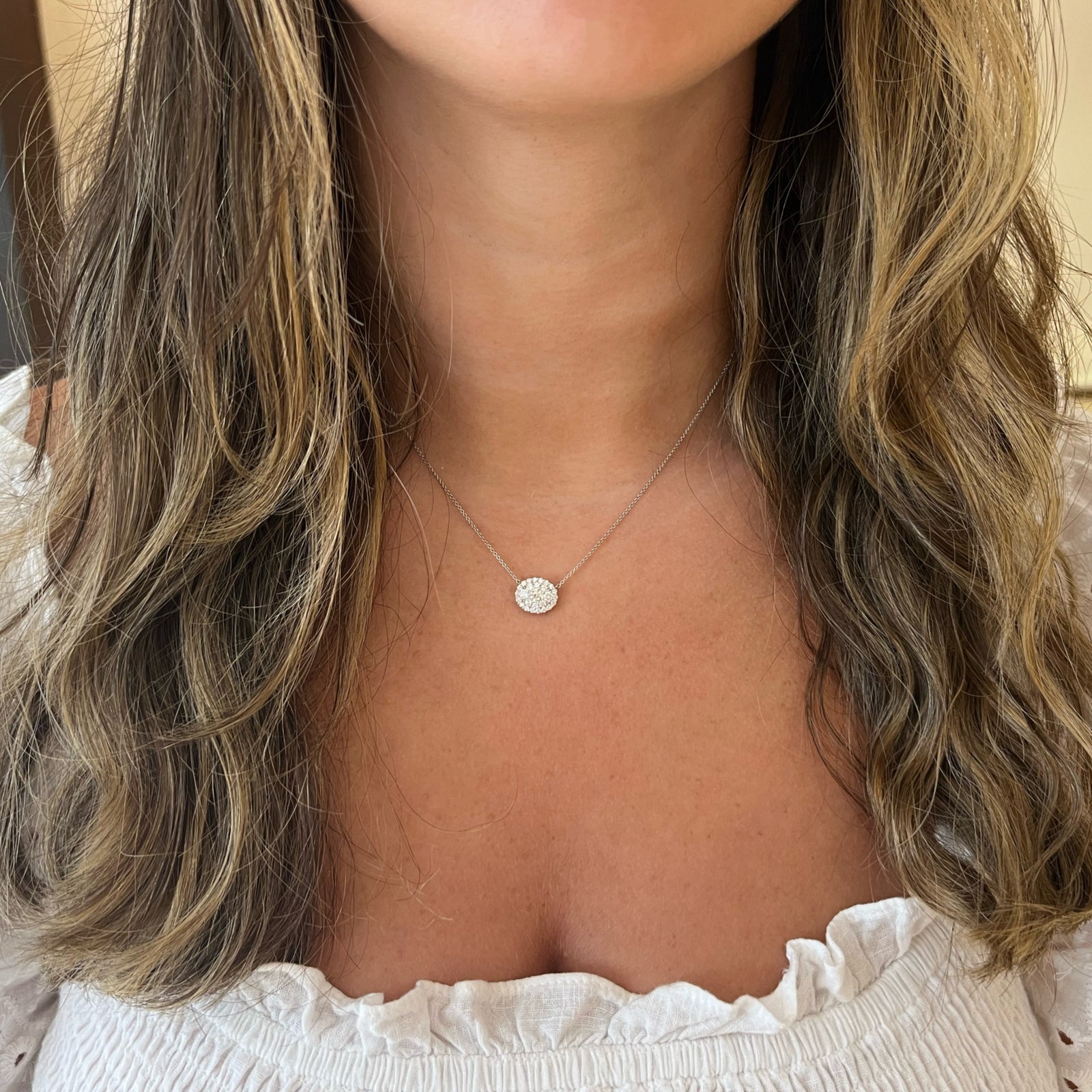 Diamond Oval Cluster Pendant Necklace - 18K gold weighing 2.66 grams  - 27 round diamonds weighing 0.71 carats