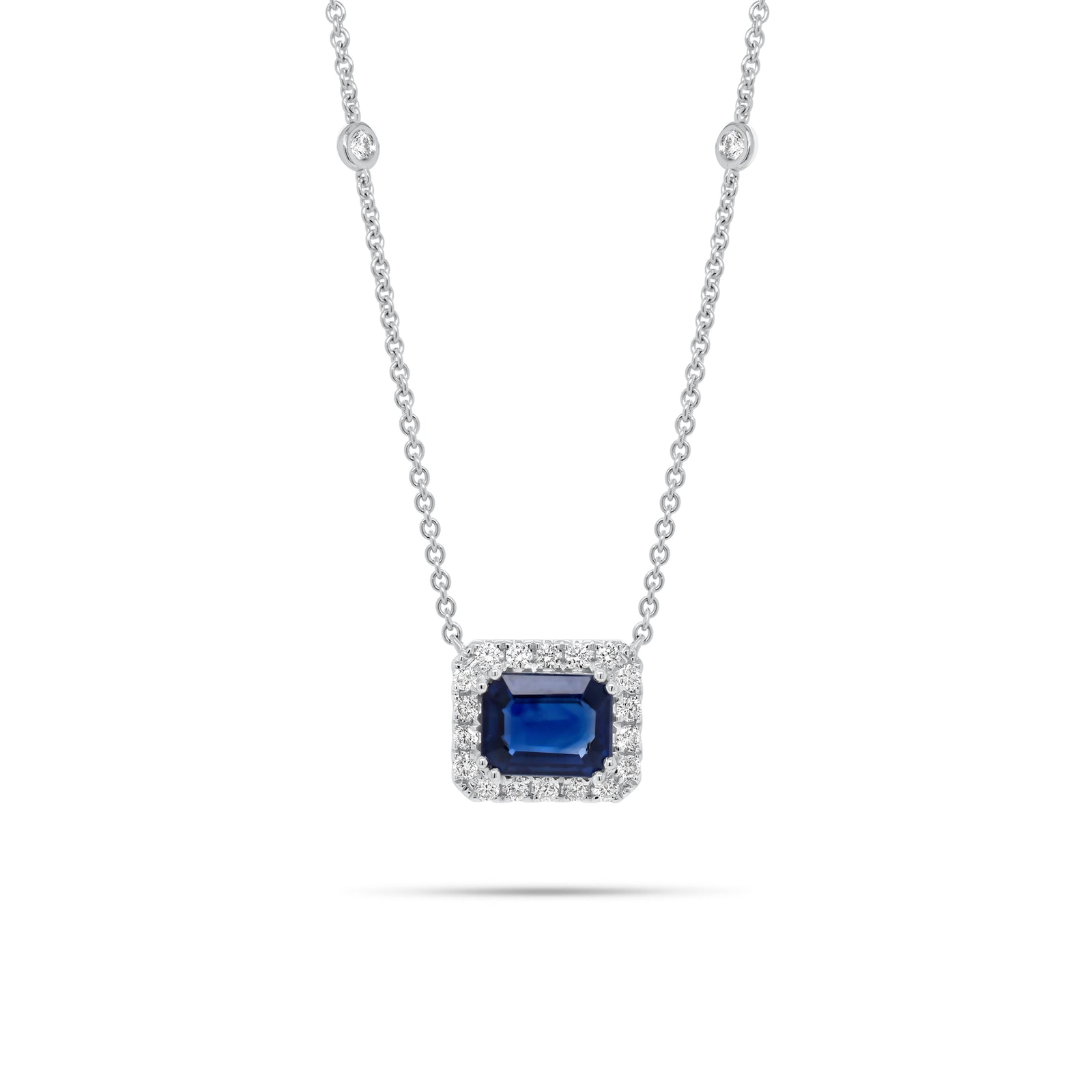 Emerald-Cut Sapphire Halo Diamond Pendant Necklace 18K gold weighing 4.79 grams  2.09 ct emerald-cut sapphire  - 22 round diamonds weighing 0.44 carats
