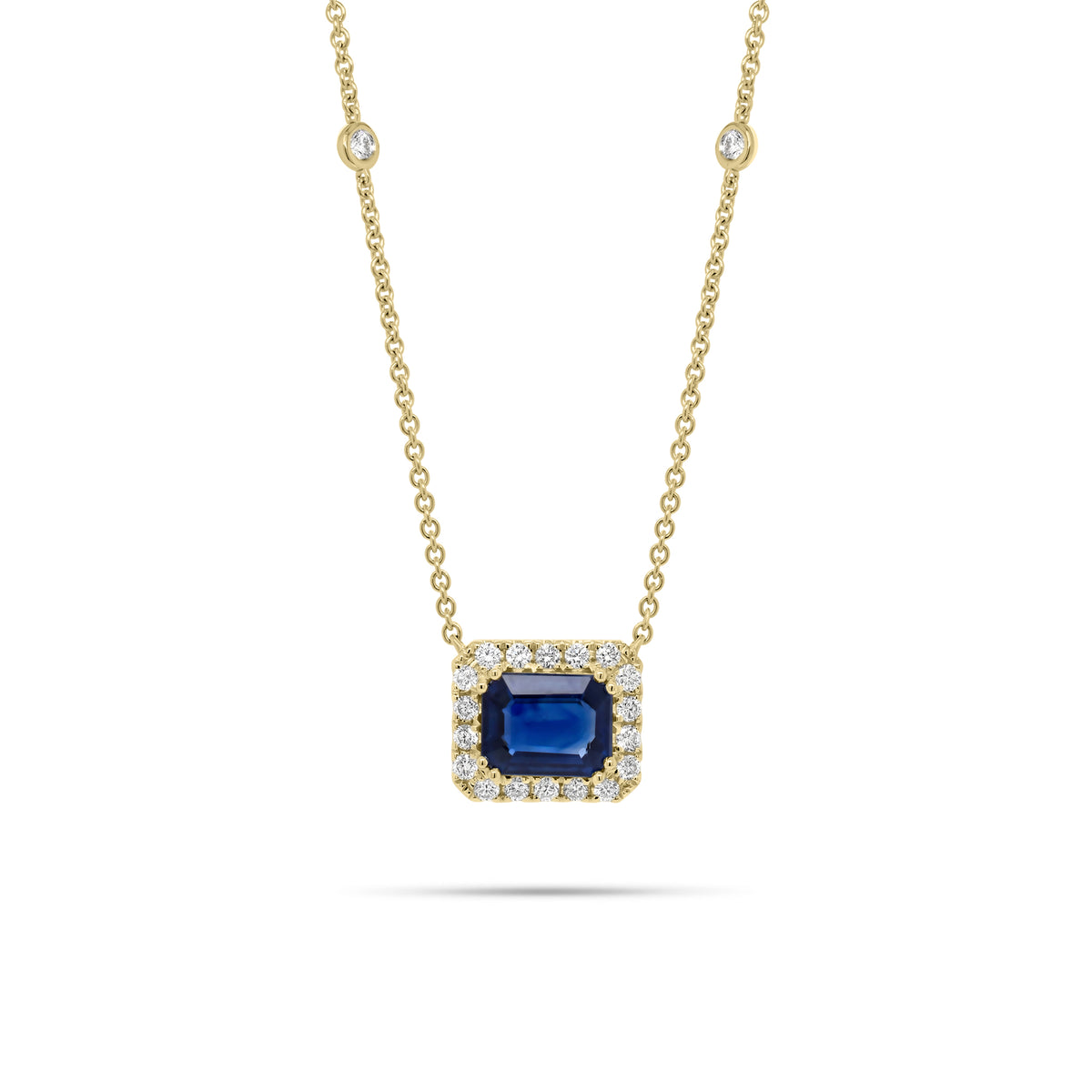 Emerald-Cut Sapphire Halo Diamond Pendant Necklace 18K gold weighing 4.79 grams 2.09 ct emerald-cut sapphire - 22 round diamonds weighing 0.44 carats