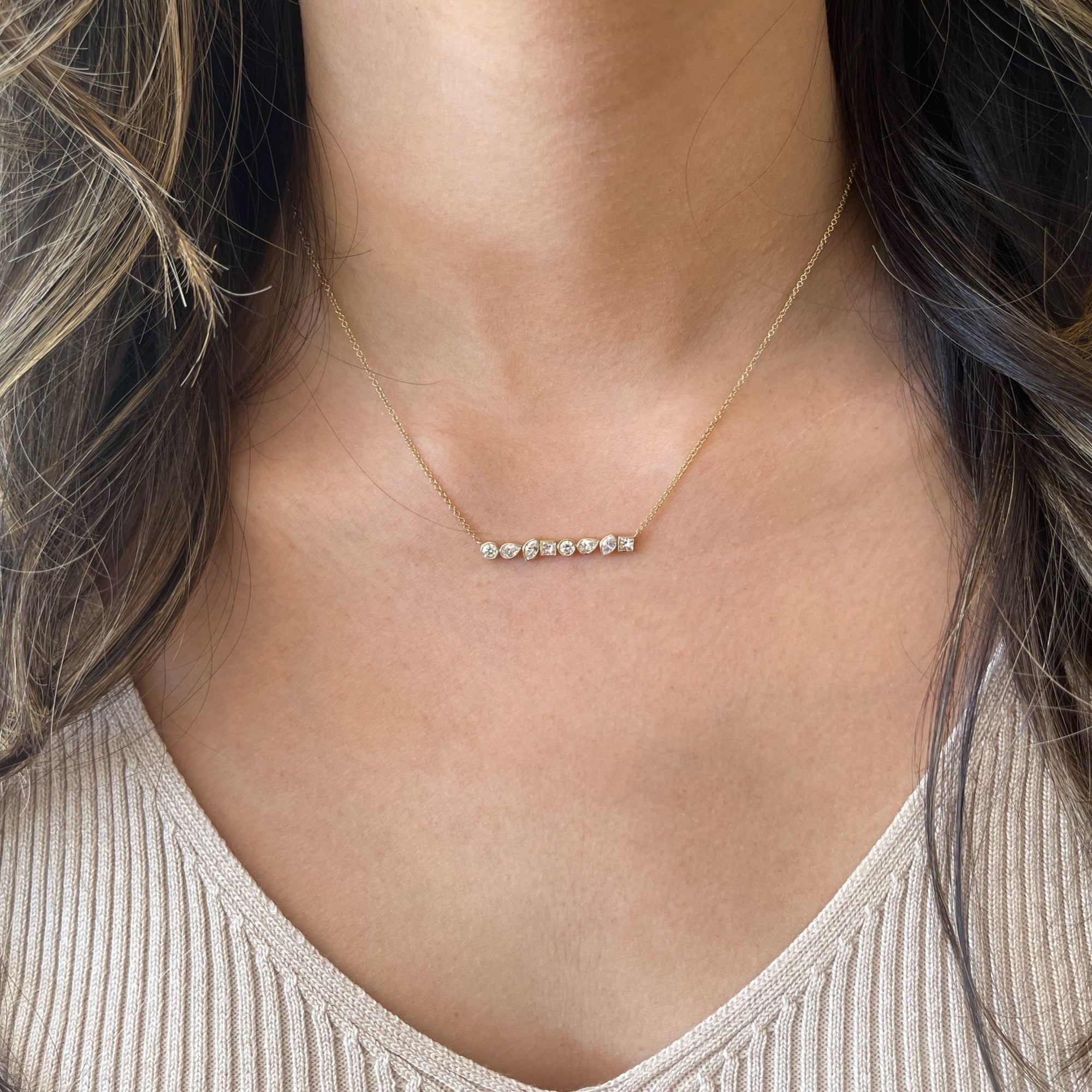 Mixed Shape Bezel-Set Diamond Bar Pendant  - 14K gold weighing 2.25 grams  - 8 mixed shape diamonds weighing 0.84 carats