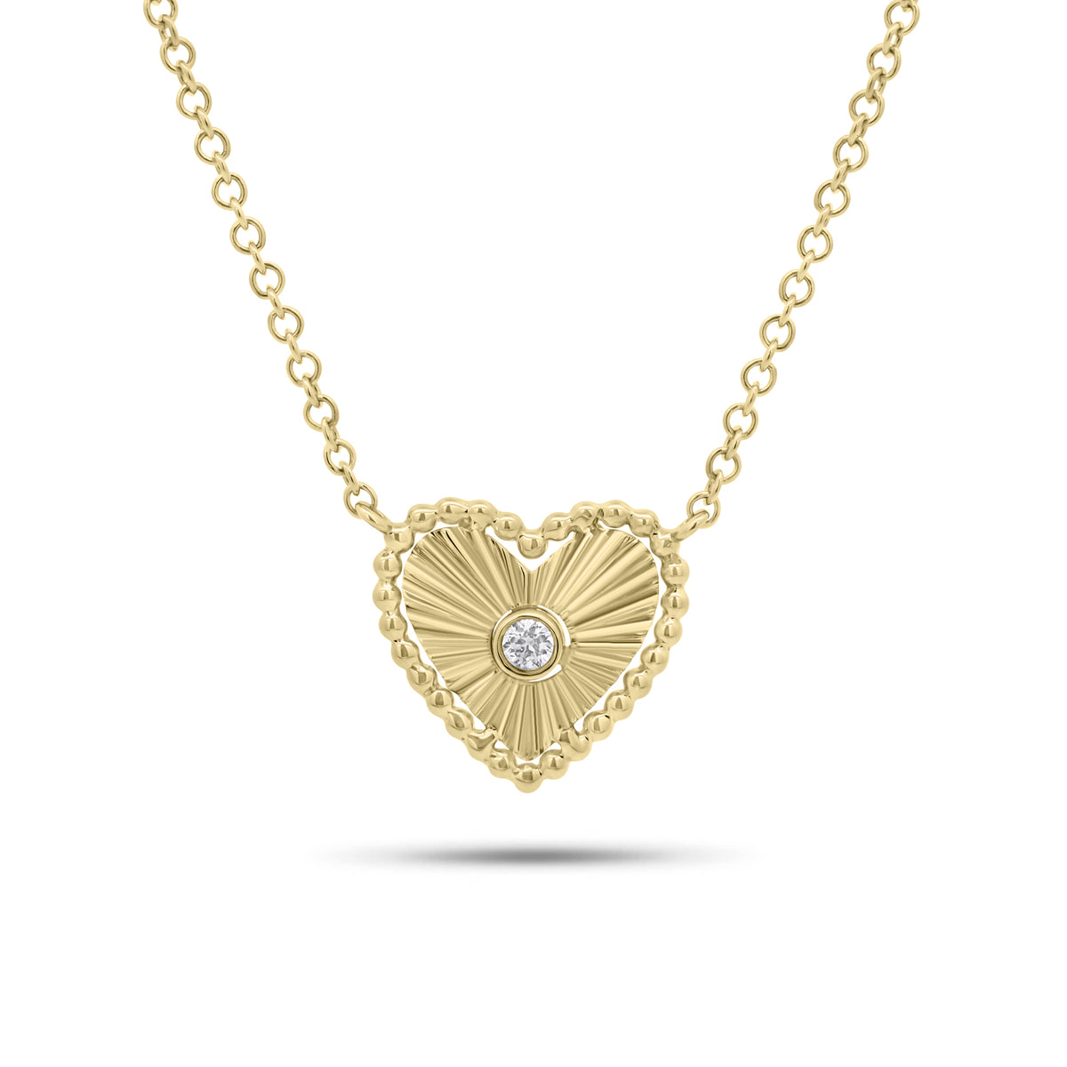 Bezel-set diamond & fluted gold heart pendant - 14K gold weighing 2.24 grams
- 0.02 ct round diamond