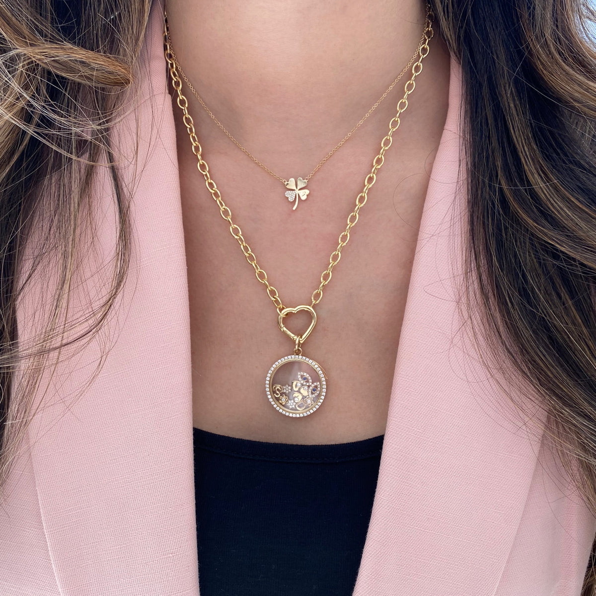 Female Model Wearing Diamond-Accented Four-Leaf Clover Pendant Necklace - 14K gold weighing 2.17 grams - 21 round diamonds weighing 0.04 carats