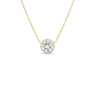 Diamond Pendant with Subtle Halo - 18K gold weighing 2.85 grams  - 1.46 ct diamond (GIA-graded I-color, I2 clarity (filled))  - 24 round diamonds weighing 0.09 carats
