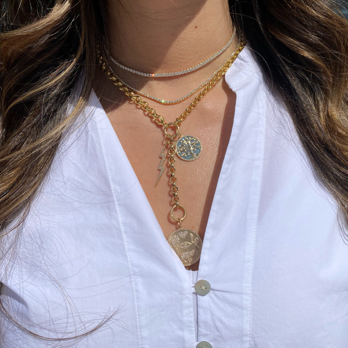 Female Model Wearing Diamond Tree of Life Circle Pendant - 14K gold weighing 3.24 grams - 71 round diamonds weighing 0.28 carats