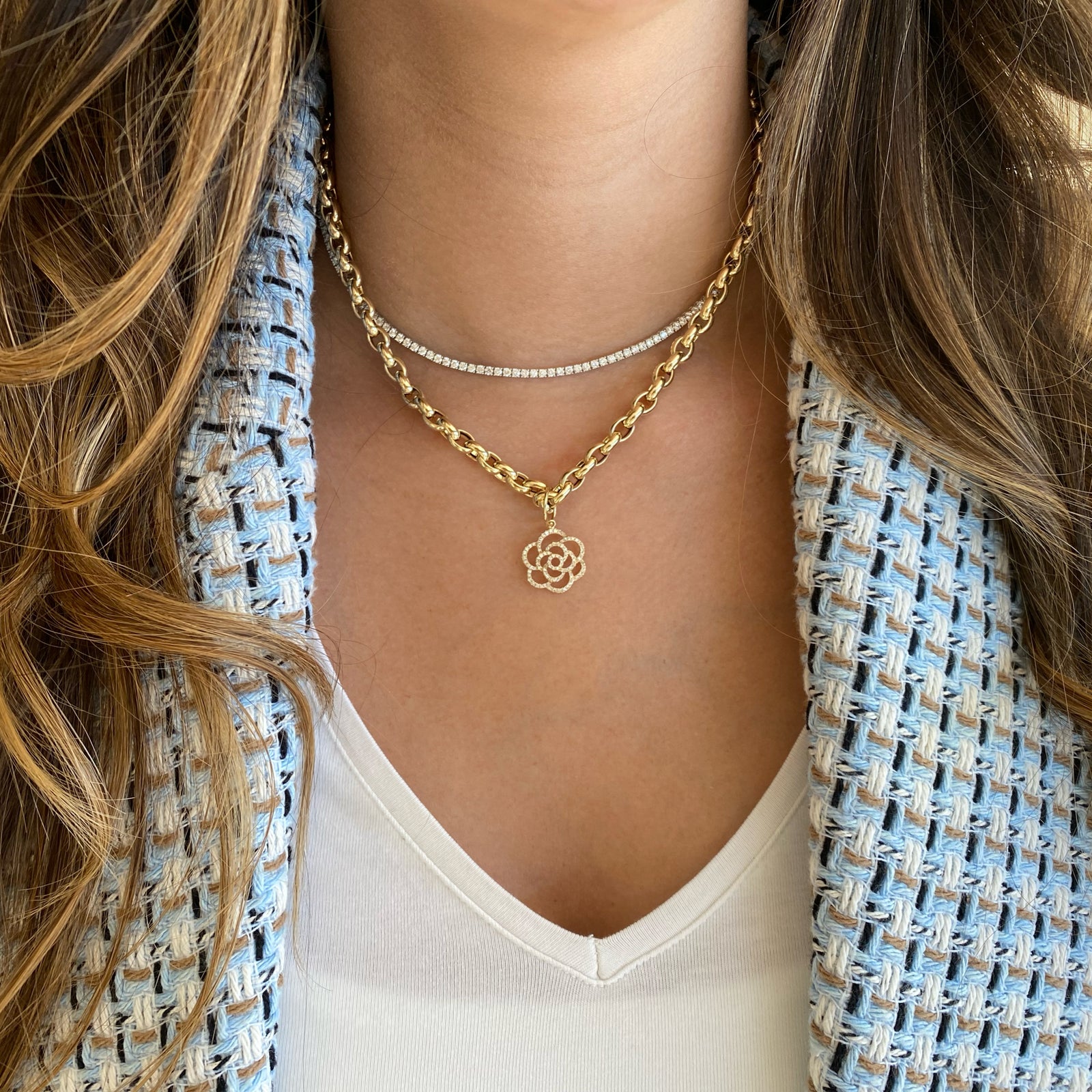 Diamond Rose Cutout Pendant - 14K gold weighing 1.54 grams  - 90 round diamonds weighing 0.28 carats