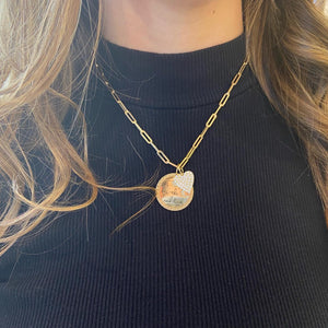 Female model wearing Diamond "I love you to the moon and back" pendant - 14K gold weighing 6.16 grams  - 19 round diamonds weighing 0.06 carats