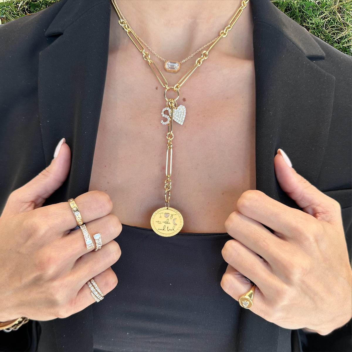 Female Model Wearing Emerald-Cut Diamond Wrap Ring - 14K gold weighing 2.98 grams - 14 emerald-cut diamonds weighing 2.11 carats